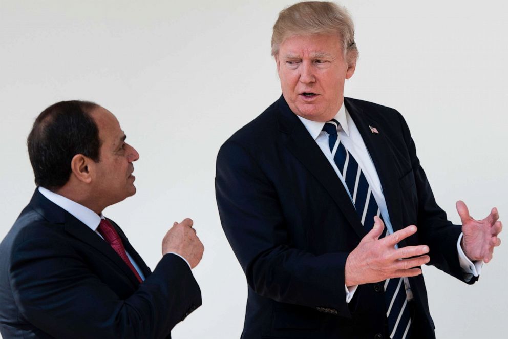 Egypt's President Abdel-Fattah el-Sissi and President Donald Trump walk down the colonnade of the White House to a lunch after a meeting on April 3, 2017 in Washington, D.C.