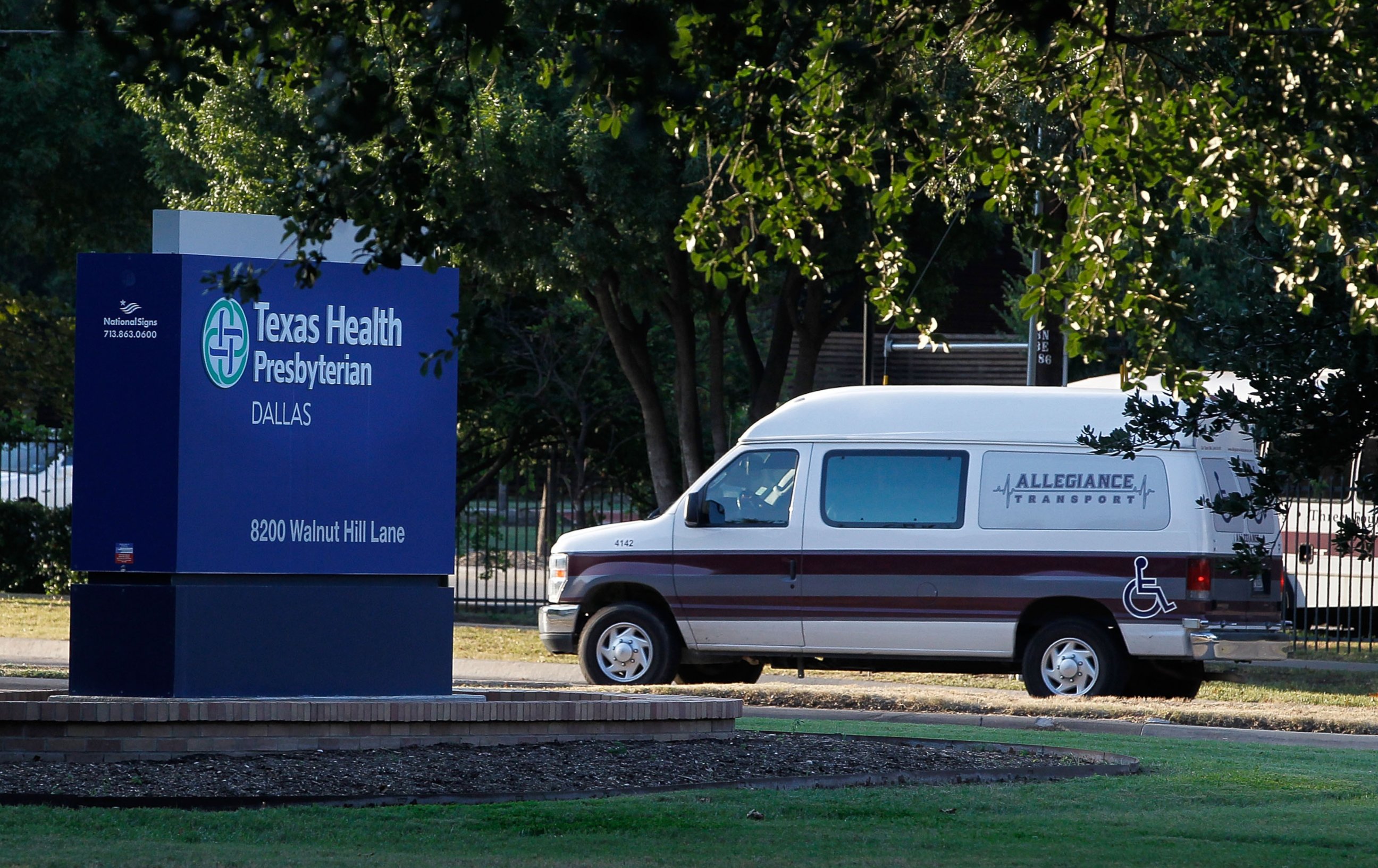 PHOTO: A medical transport van moves past Texas Health Presbyterian Hospital Dallas where a patient has been diagnosed with the Ebola virus, Sept. 30, 2014 in Dallas, Texas. 