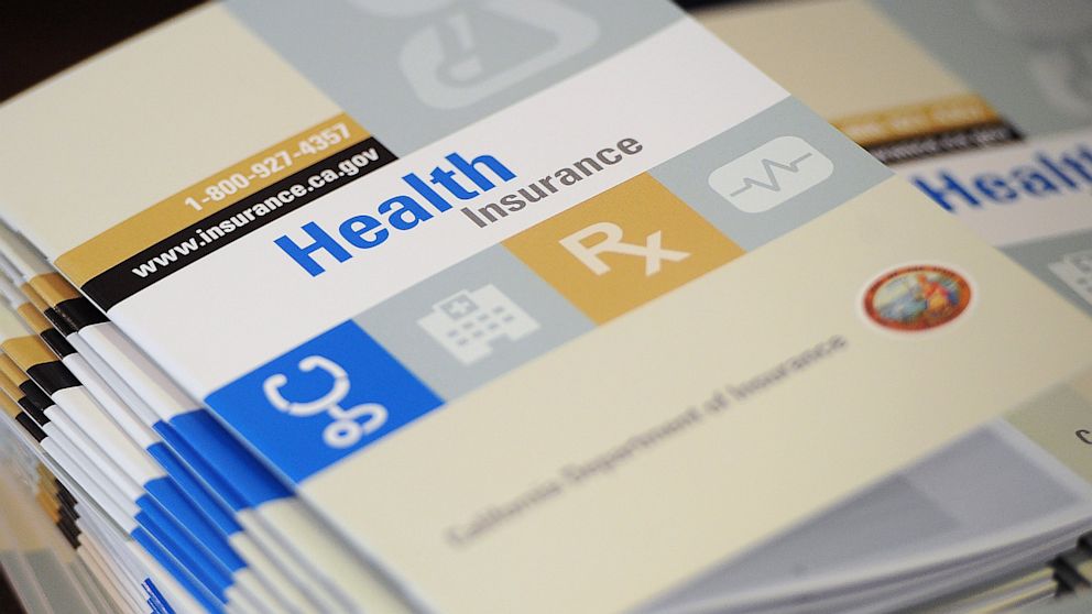Booklets outlining health insurance options for are shown at a senior information and resource fair in South Gate, Calif., Sept. 10, 2013.