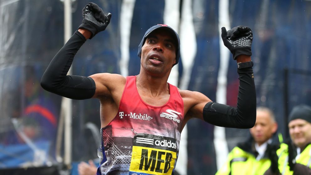 PHOTO: Meb Keflezighi of the United States reacts after crossing the finish line during the 119th Boston Marathon on April 20, 2015 in Boston, Mass.