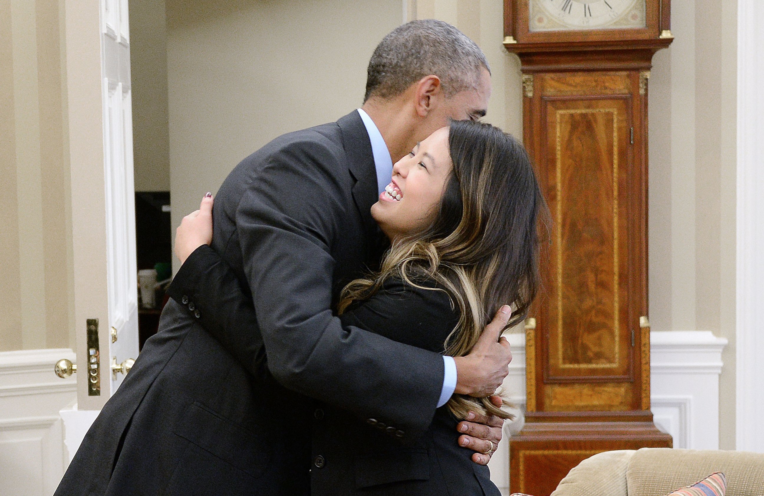 PHOTO: President Barack Obama gives a hug to Dallas nurse Nina Pham in the Oval Office of the White House on Oct. 24, 2014 in Washington, D.C.