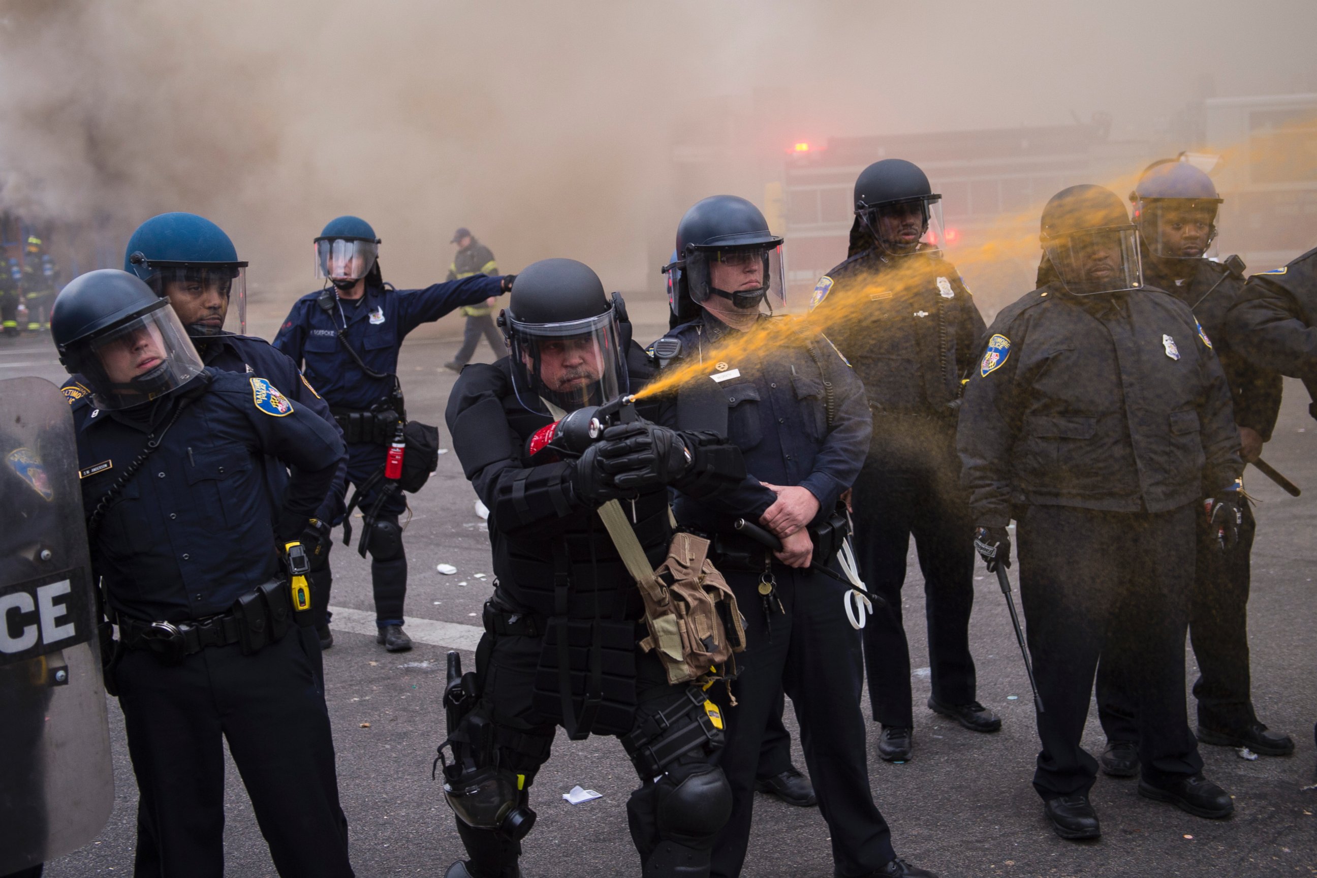 PHOTO: Officers pepper spray people near West North Avenue and Pennsylvania Avenue during a protest for Freddie Gray in Baltimore, Md. on April 27, 2015.