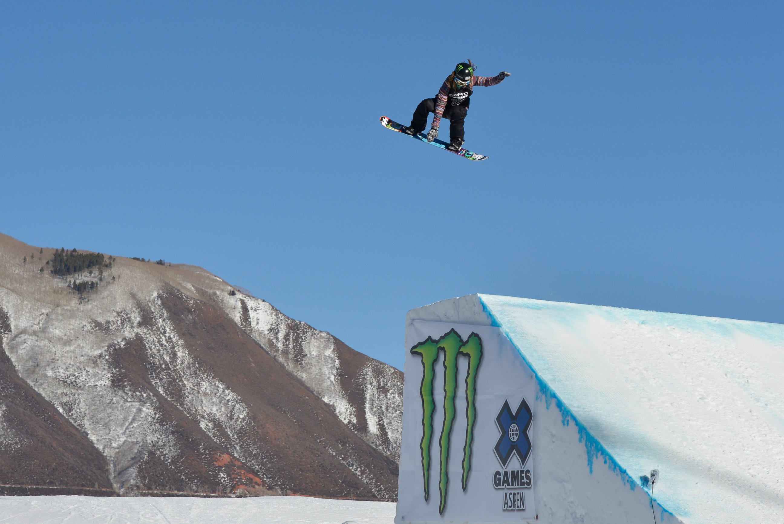 PHOTO: Jamie Anderson soars en route to a silver medal in the women's snowboard slopestyle Winter X-Games 2014 at Buttermilk Mountain on Jan. 25, 2014 in Aspen, Colo. 