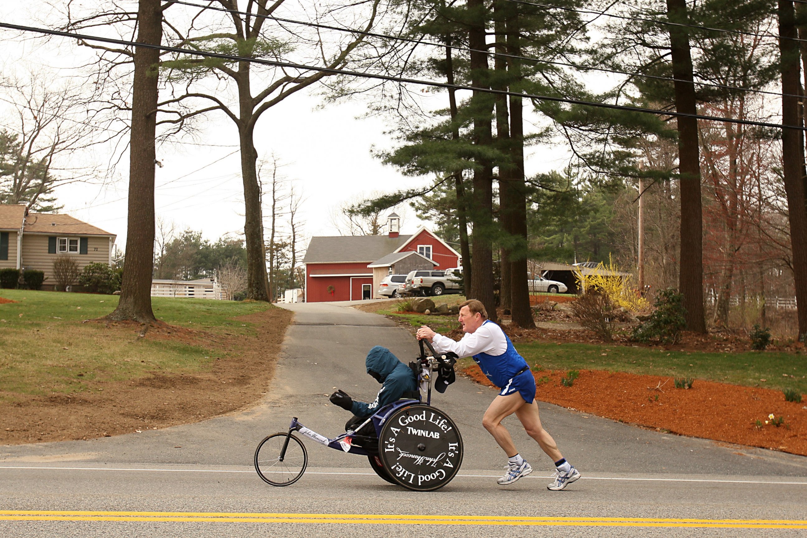 PHOTO: Dick Hoyt pushes Rick Hoyt as they compete in the 2008 Boston Marathon on April 21,2008 in Hopkinton, Massachusetts. 