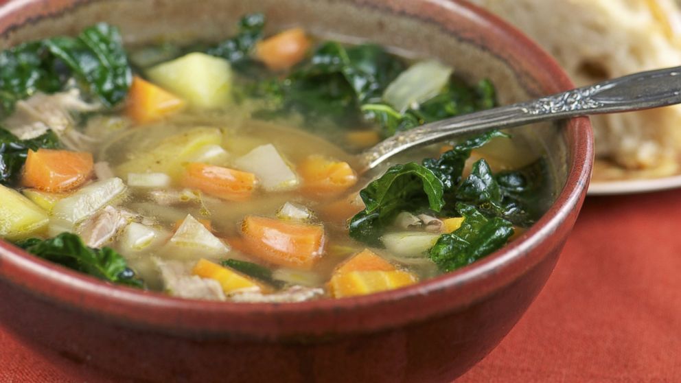 A bowl of turkey soup, with kale and carrots, contains ingredients scientifically proven to make you feel better.