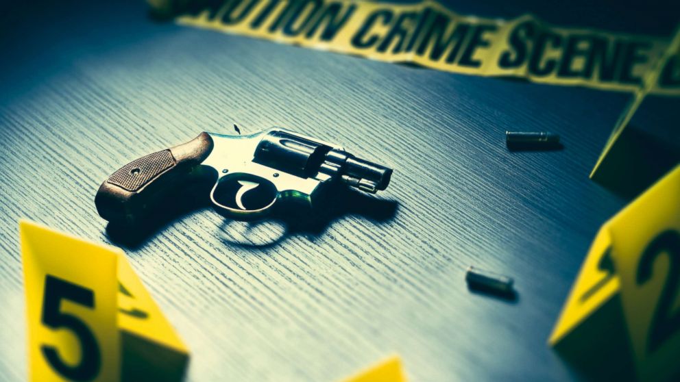 PHOTO: A crime scene with gun and markers on the floor is pictured in this undated stock photo.