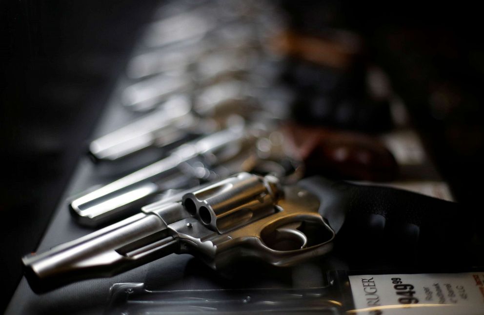 PHOTO: In this Dec. 21, 2108, file photo, handguns for sale are lined up in a display case in a gun shop.