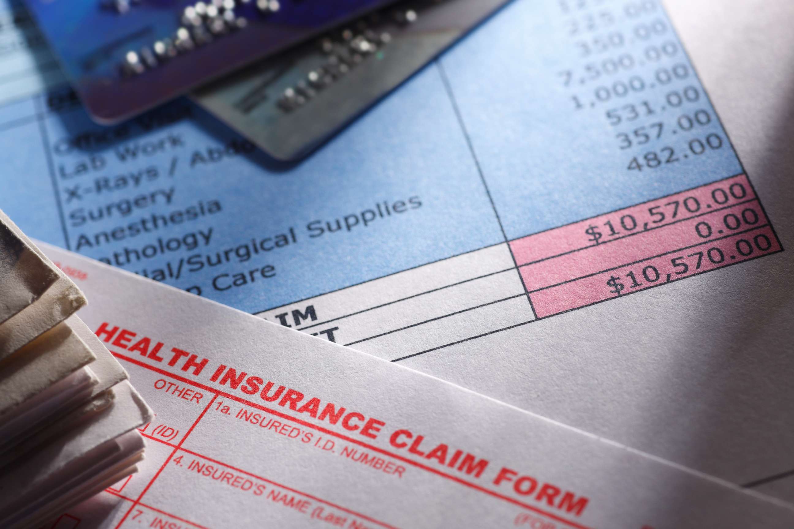 PHOTO: A health insurance claim form is picture next to a hospital bill in an undated stock photo.