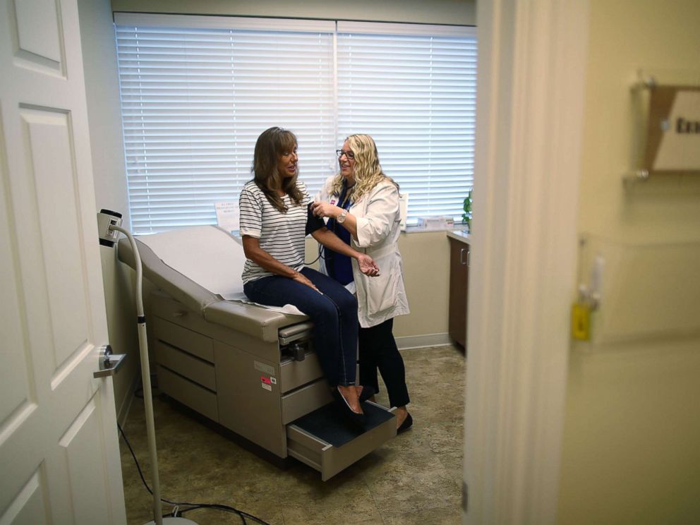PHOTO: A woman has her blood pressure checked by a registered nurse practitioner during a checkup at a Planned Parenthood health center on July 13, 2017 in Wellington, Fla.