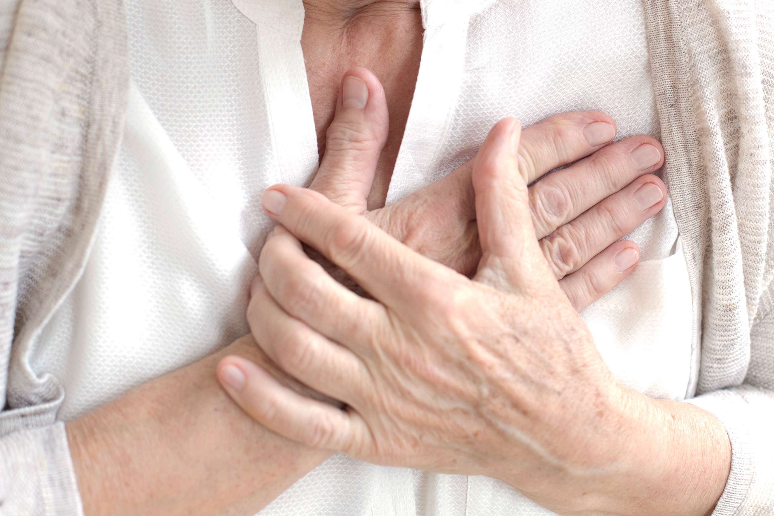 PHOTO: A woman holds her chest in this undated stock photo.