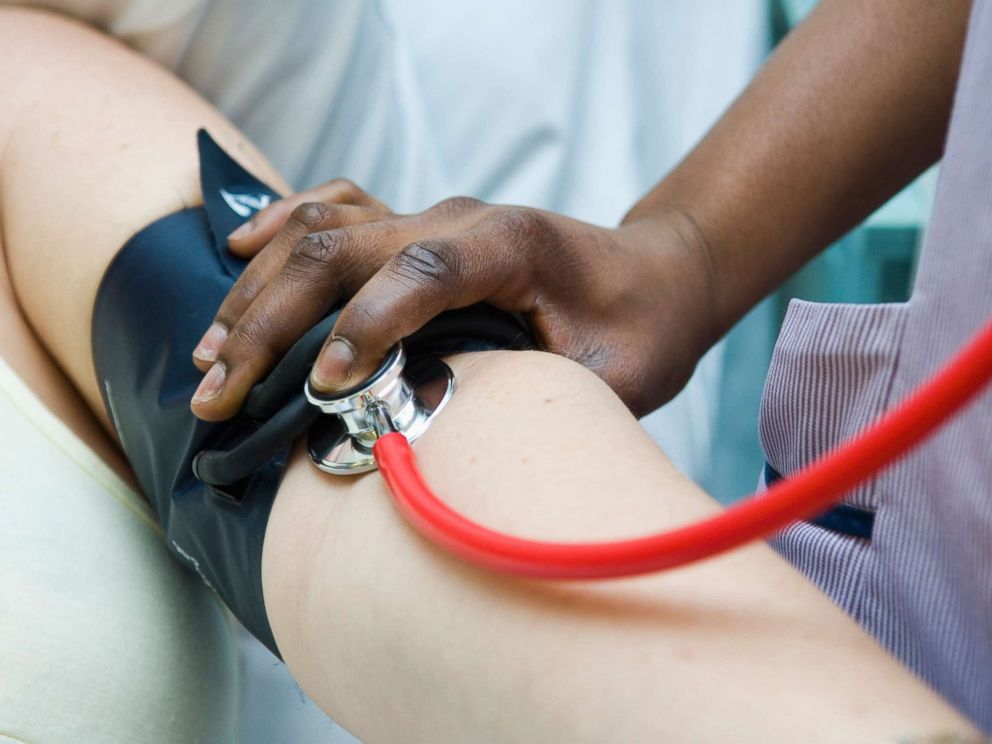 PHOTO: A nurse takes a patients pulse in an undated stock photo.