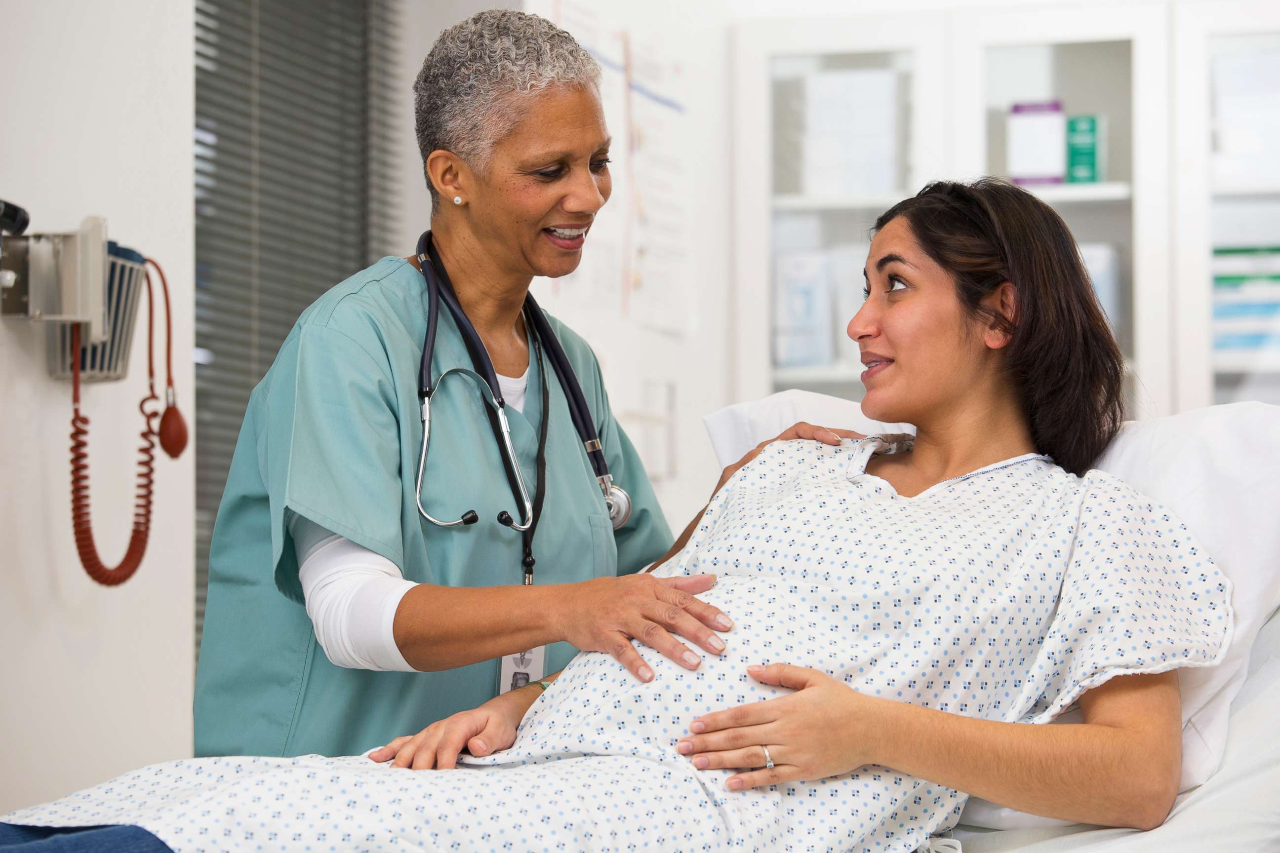 PHOTO: A doctor examines a pregnant woman in an undated stock photo. 