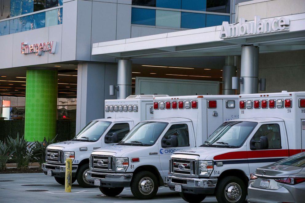 PHOTO: Three ambulances are parked in front of the emergency room at Children's Health of Orange County (CHOC), which is busy handling child respiratory cases in a surge that caused an OC medical emergency, Orange County, California, Nov. 1, 2022. 