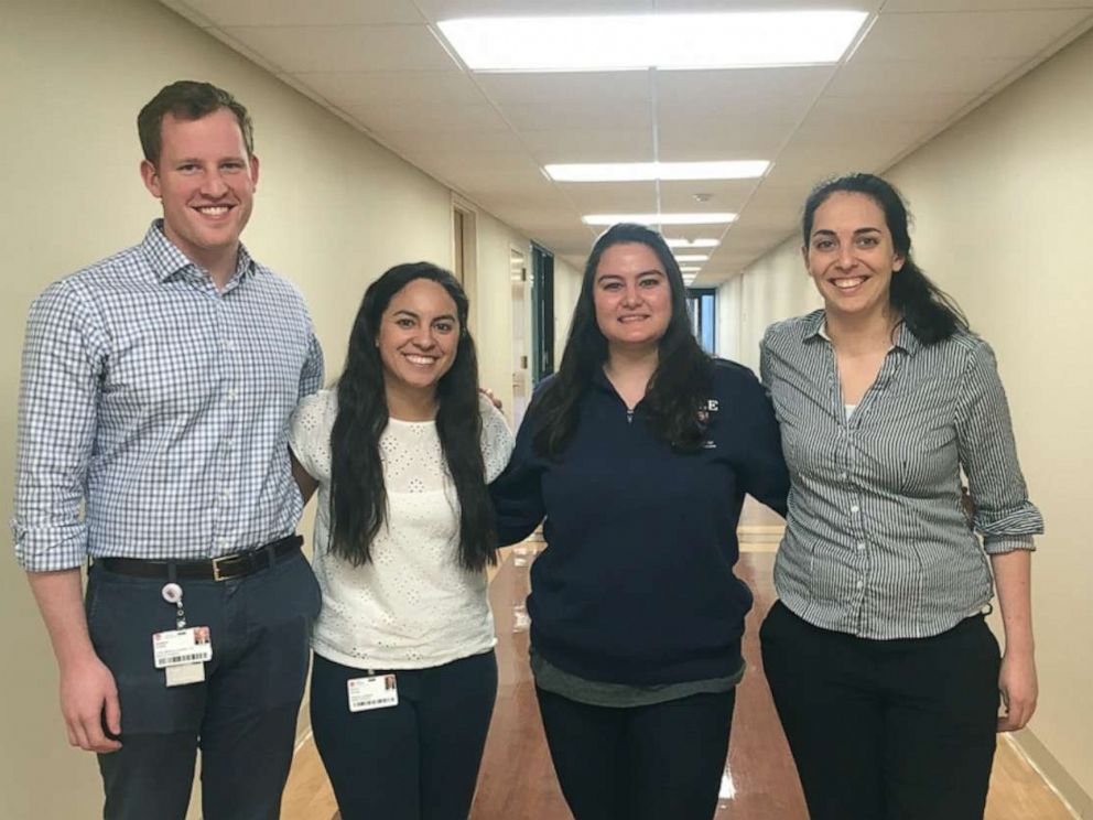 PHOTO: Part of leadership from Loyola University’s medical students who helped staff the hospital’s hotline stand on-call in the center.