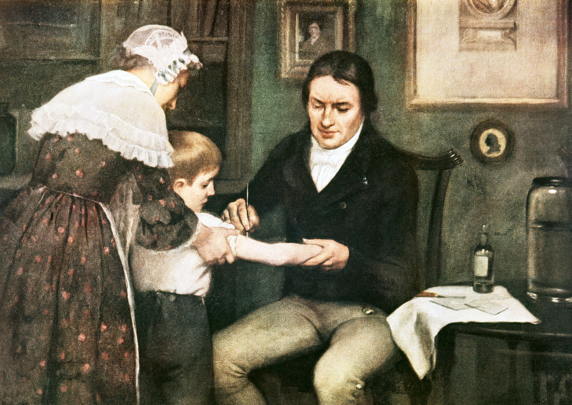 PHOTO: An oil painting by depicts Dr Edward Jenner performing his first vaccination against smallpox on James Phipps, a boy of eight in England, May 14, 1796.
