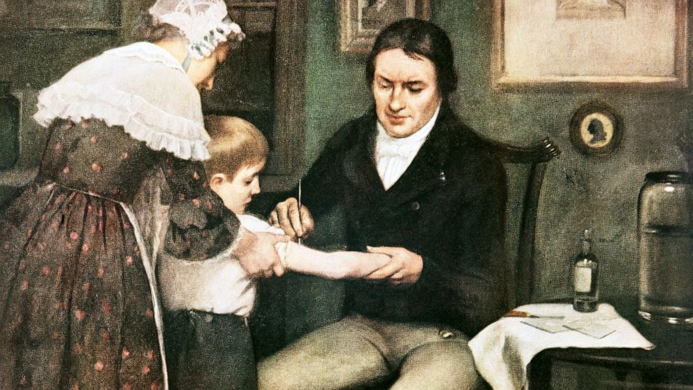 PHOTO: An oil painting by depicts Dr Edward Jenner performing his first vaccination against smallpox on James Phipps, a boy of eight in England, May 14, 1796.
