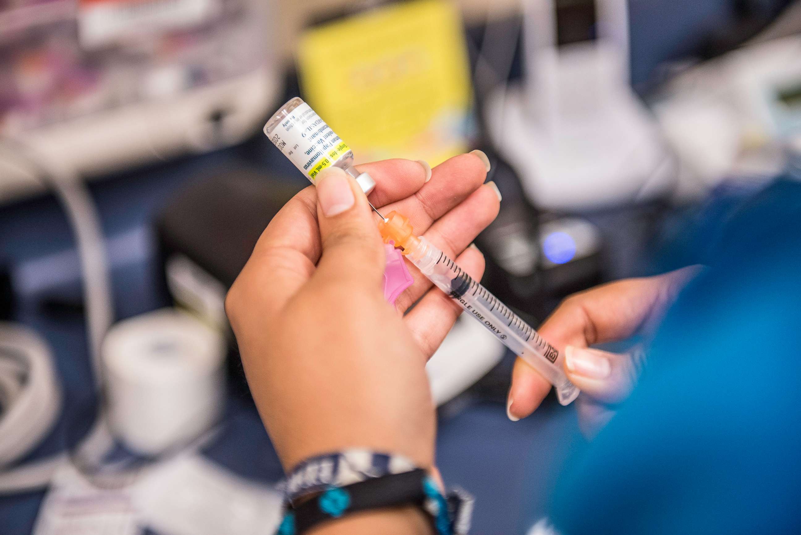 PHOTO: Certified medical assistant Karla Huerta fills a needle with the drug Gardasil, used for HPV vaccinations, at Amistad Community Health Center in Corpus Christi, Texas, on Friday, May 27, 2016.