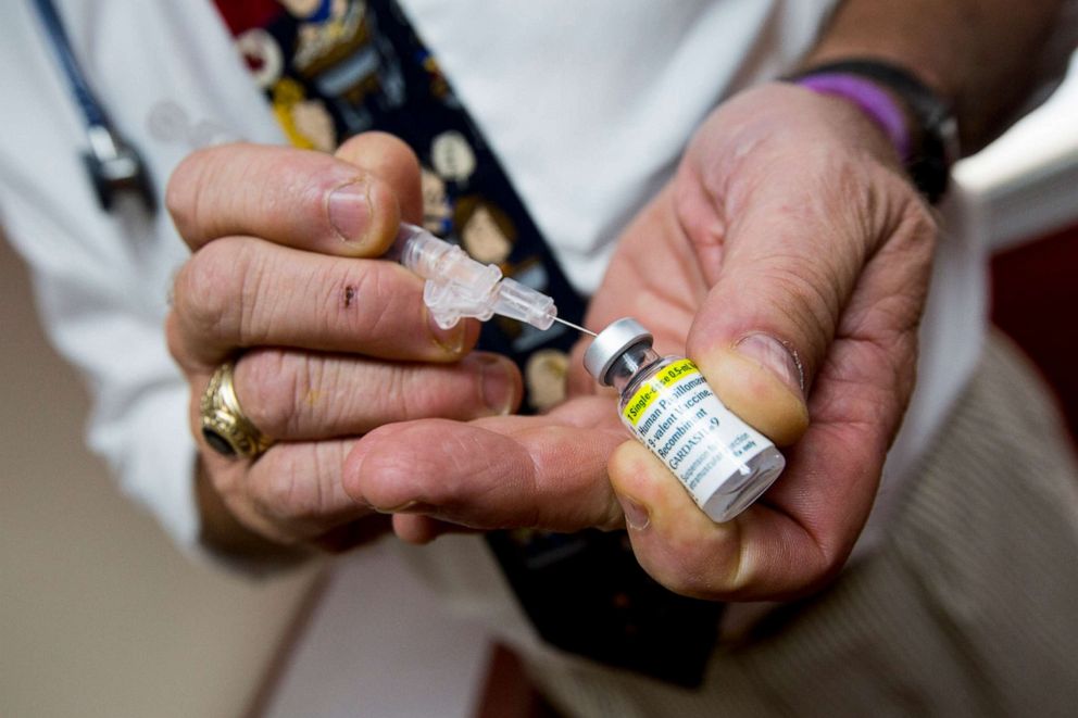 PHOTO: A pediatrician prepares a shot of the HPV vaccine Gardasil for a patient at  in Cranston, R.I., Sept. 3, 2015.