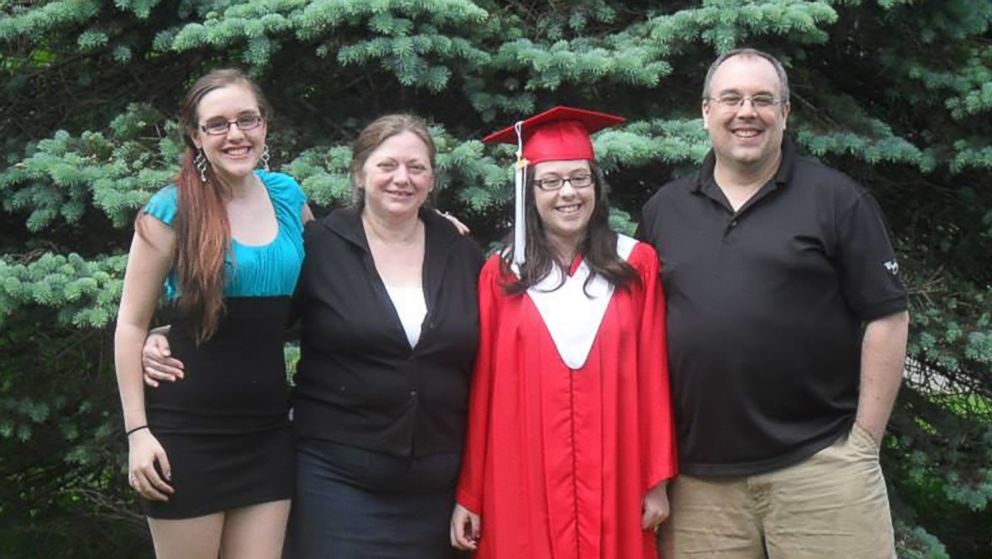 PHOTO: Becca Schofield, 17, of Riverview, New Brunswick, poses with her family at her sister's graduation in 2014.