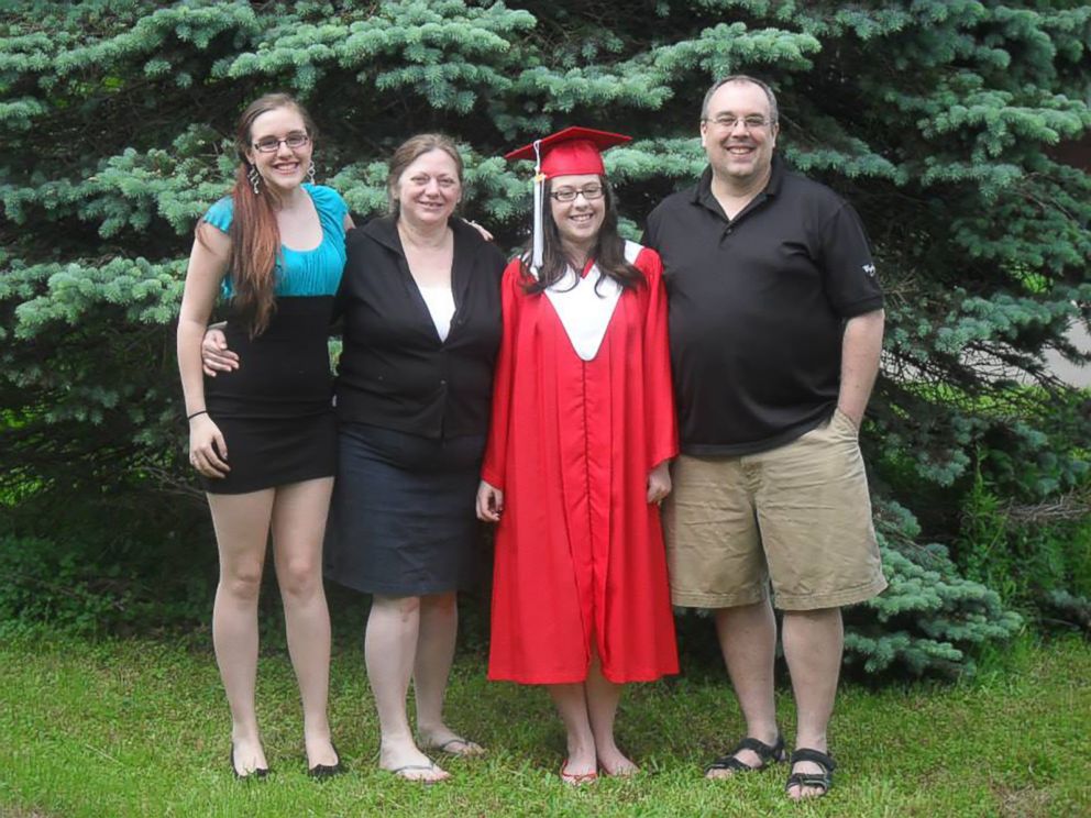PHOTO: Becca Schofield, 17, of Riverview, New Brunswick, poses with her family at her sister's graduation in 2014.