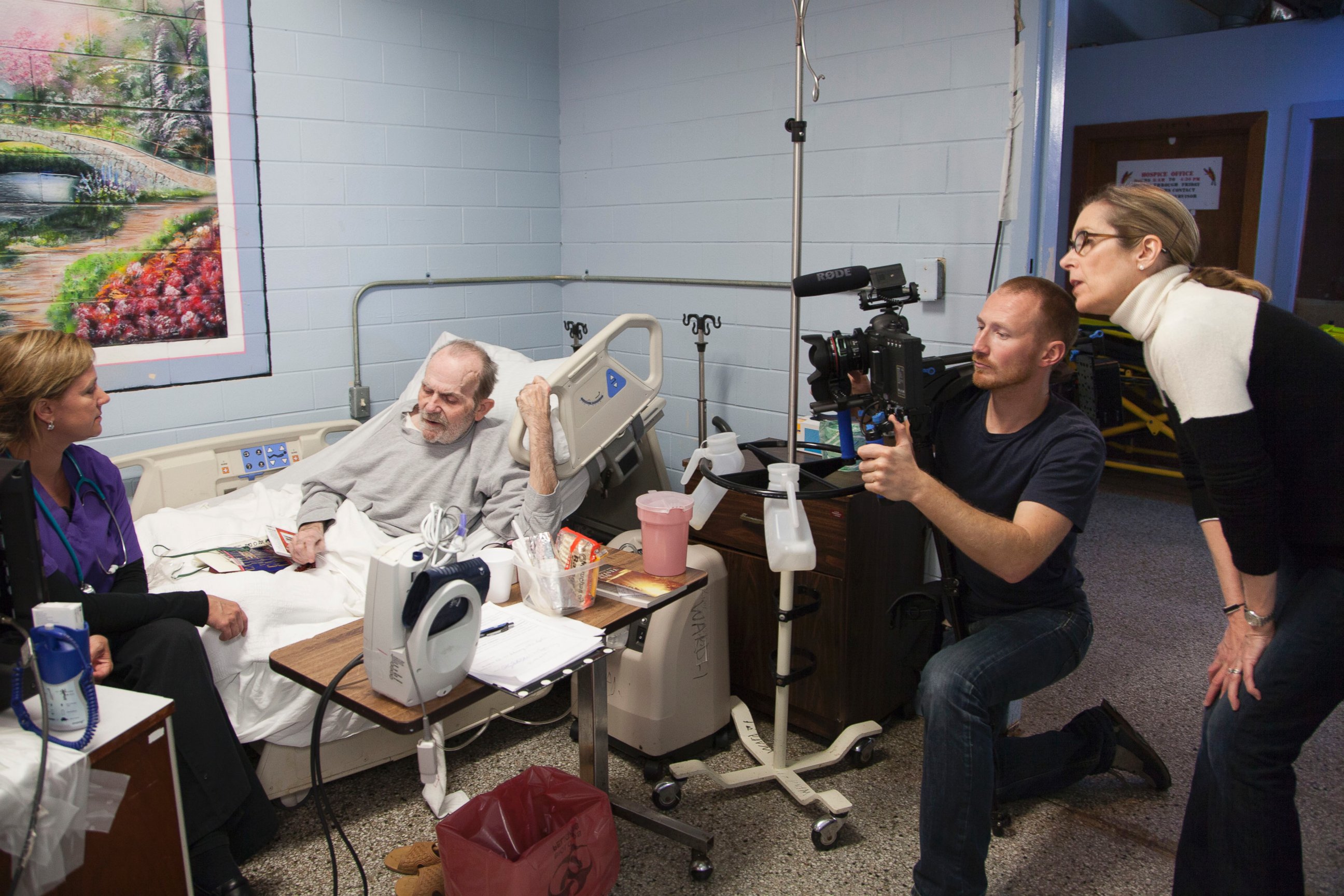 Tonia Faust cares for a patient in the hospital ward at the Louisiana State Penitentiary.