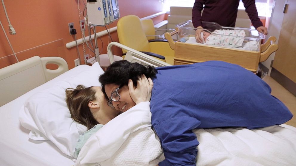 Naomi hugs patient Becky after the joyous and successful delivery of baby Felix.