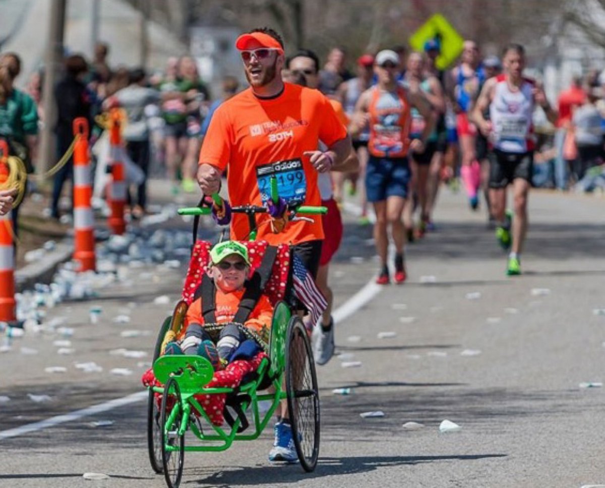 PHOTO: Alosha O'Brien, 30, will participate in the Boston Marathon as Craig Welton pushes him in a wheelchair designed by Team Hoyt.