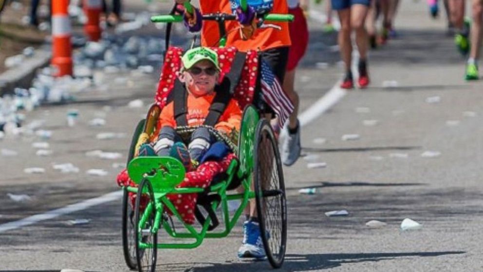 PHOTO: Alosha O'Brien, 30, will participate in the Boston Marathon as Craig Welton pushes him in a wheelchair designed by Team Hoyt.