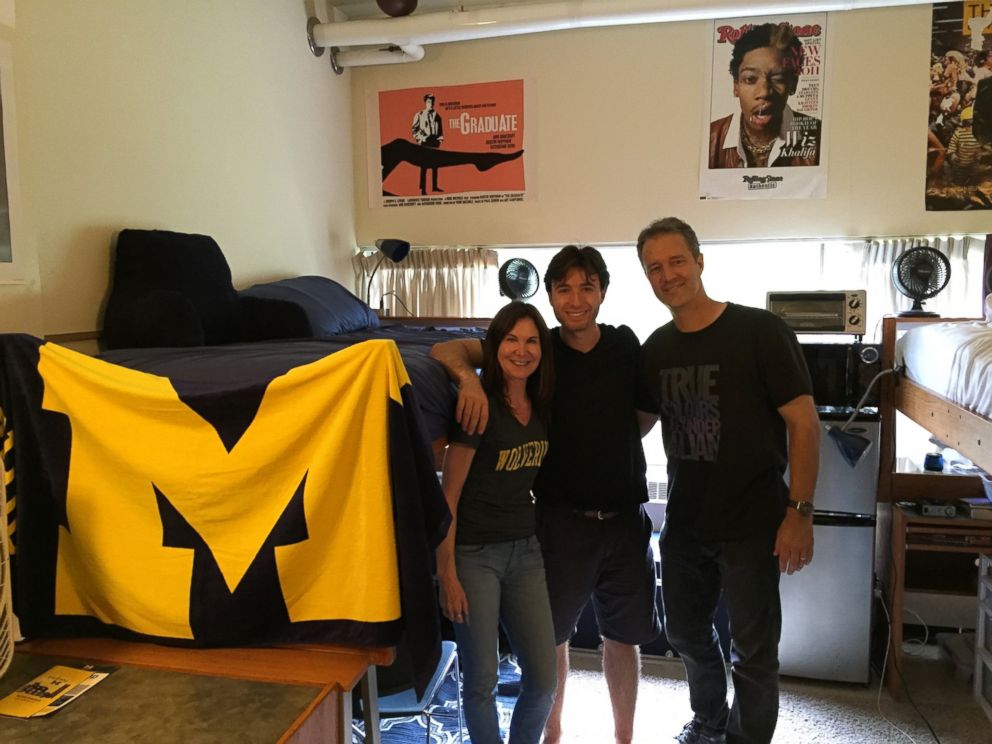 PHOTO: Jake Exkorn poses with his parents in his dorm room at the University of Michigan.