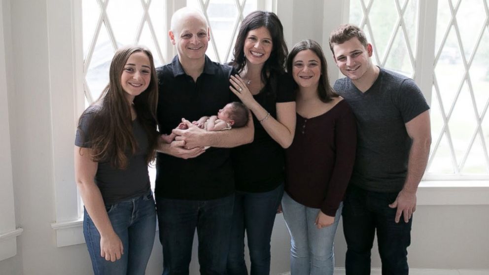 Lindsay Avner used IVF to ensure her daughter would not carry a BRCA gene mutation. She's seen here with her husband and step-children. 