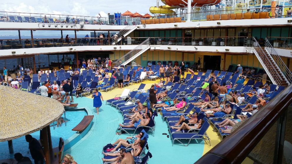 PHOTO: Jeremy Malone said that some of the cruise passengers tried not to let concerns about Ebola ruin the end of their vacation as they sunbathed on Friday.