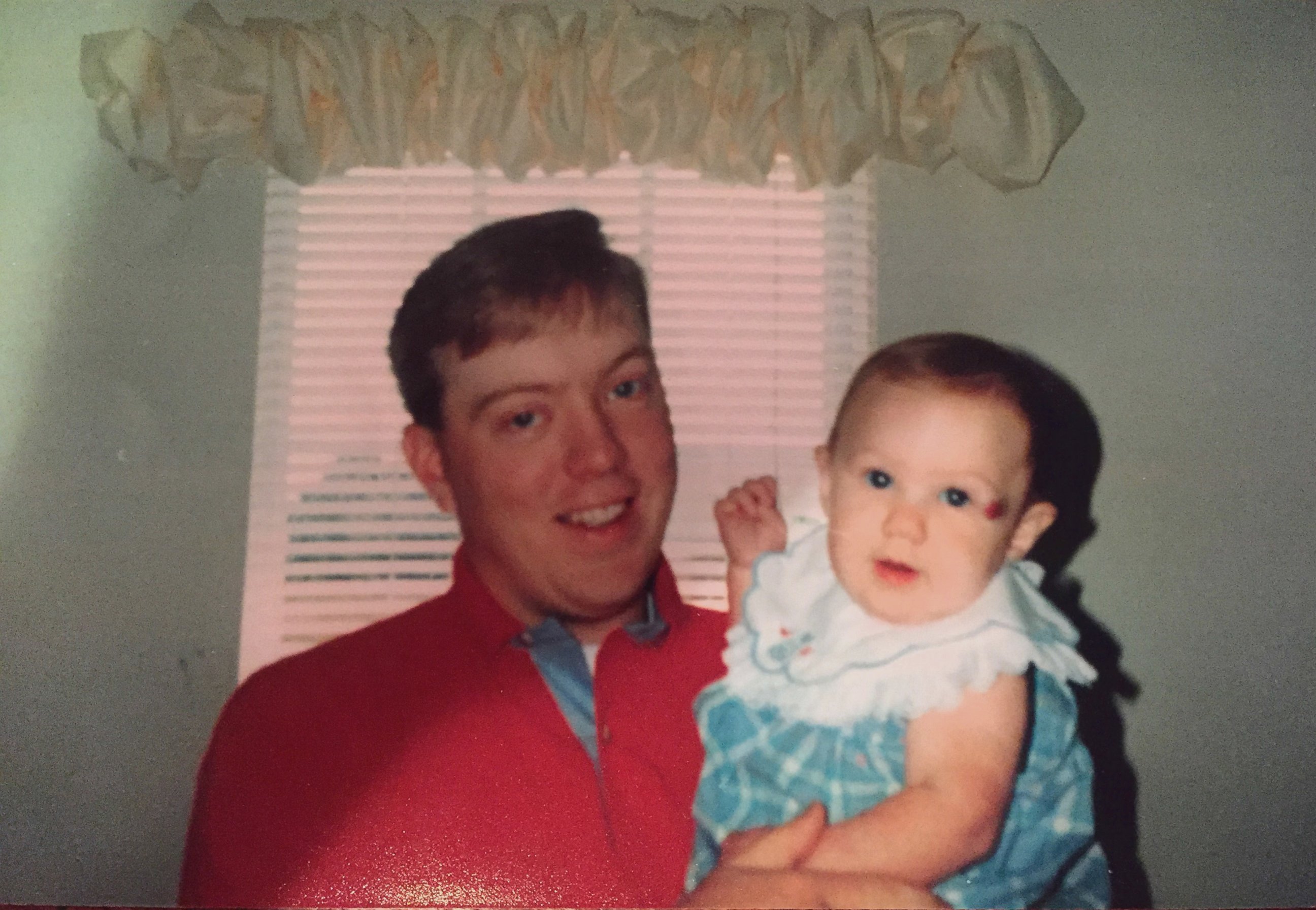 PHOTO: Pat Hardison is shown here holding his daughter in this family photo taken before the 2001 fire.