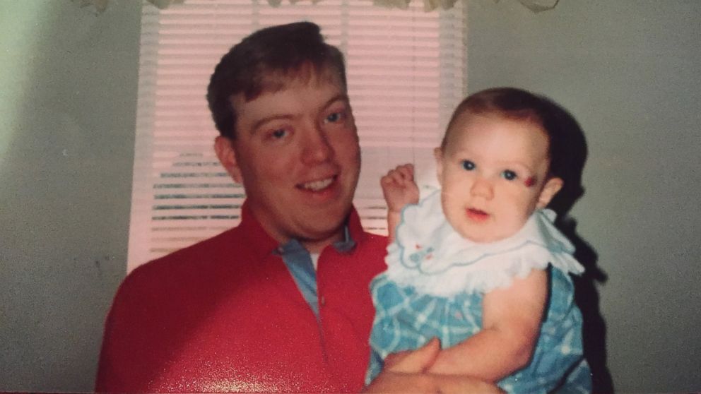 PHOTO: Pat Hardison is shown here holding his daughter in this family photo taken before the 2001 fire.