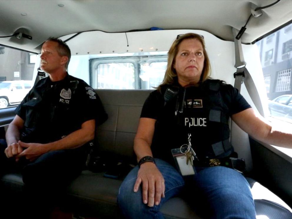 PHOTO: As part of the LEAD program, police officers Victor Maes and Lesley Mills are tasked with getting to know users in the Seattle neighborhood Belltown and target those most at risk.