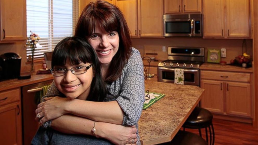 Jenna and her mom, Julie in their home in Maple Valley, Wash. Doctors were able to use stem cells from blood donated from an umbilical cord to help treat her. 