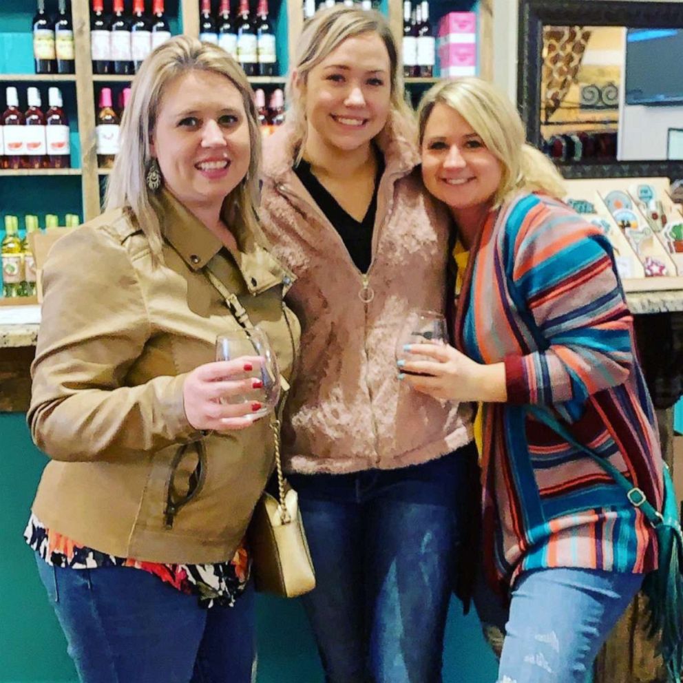 Kylie Harmon seen here with her two sisters at a winery on March 19, 2020.