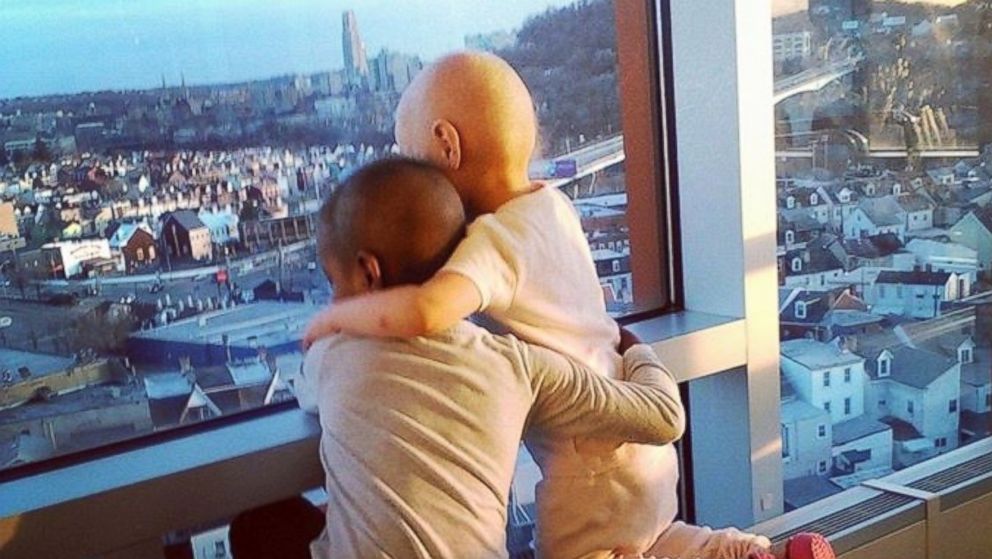 Five-year-old Maliyah Jones, who has been undergoing cancer treatments for approximately three years, is seen hugging another young cancer patient in this photo posted to Facebook by Tazz Jones on May 3, 2015.