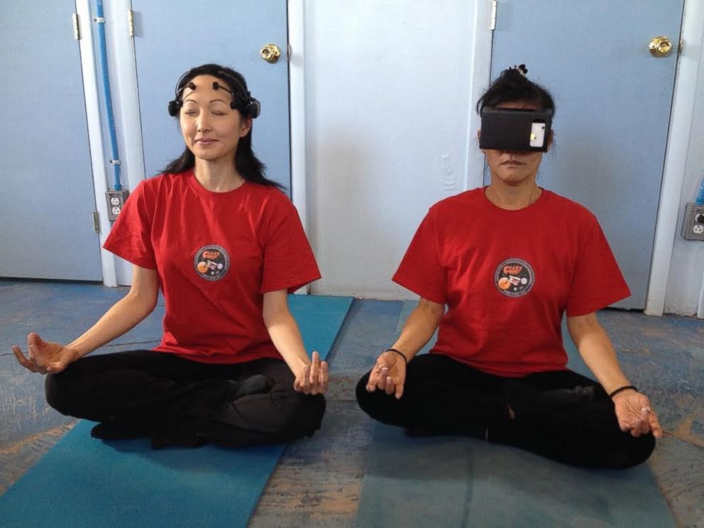PHOTO: The crew participates in daily yoga and meditation sessions to offset the effects of isolation and confinement on Mars.