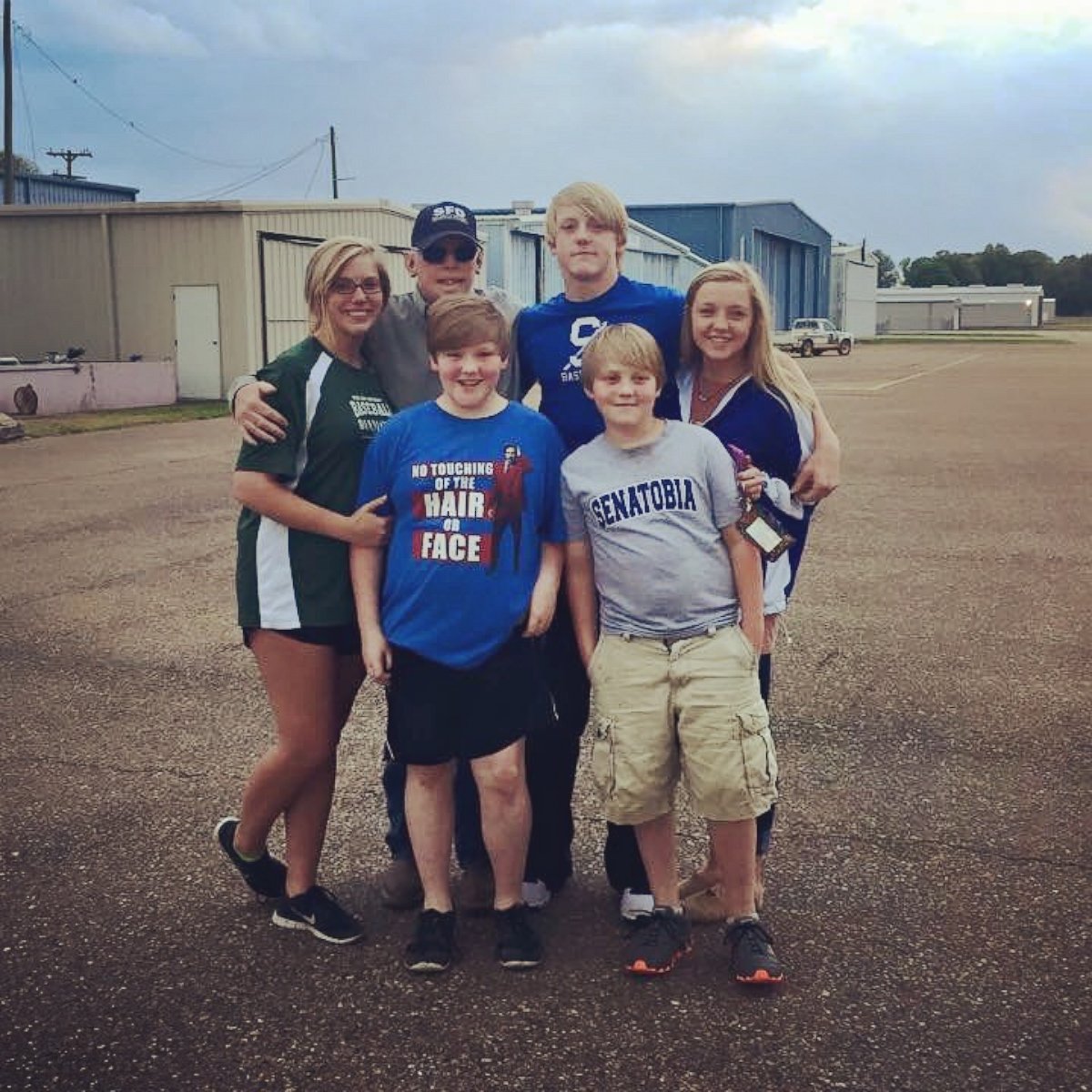 Pat Hardison is shown here wearing a baseball hat in this family photo before his face transplant surgery.