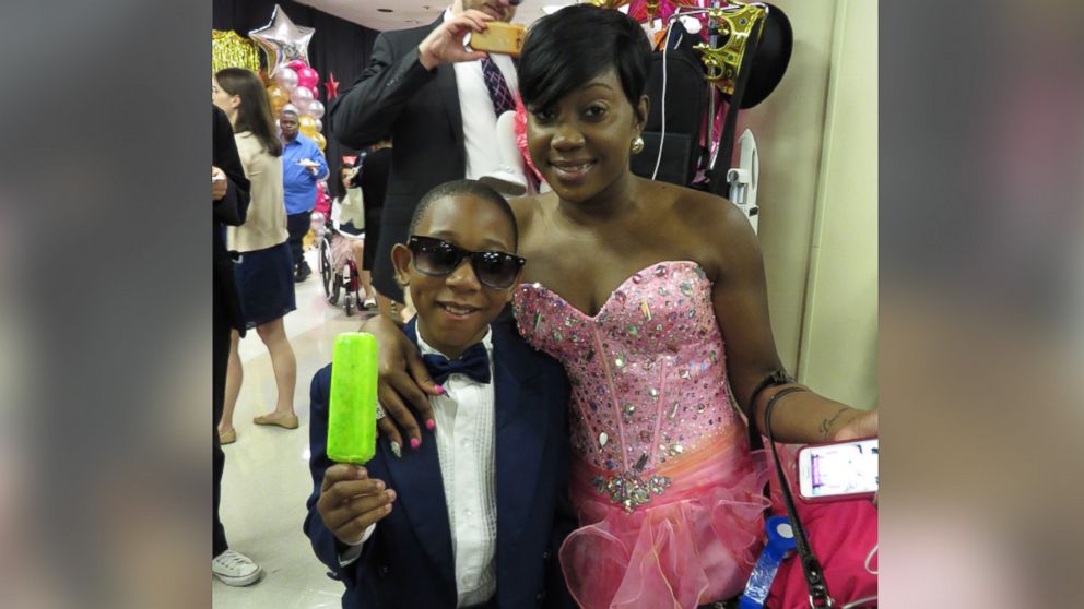 PHOTO: Dressed to the nines, these two Pediatric Prom attendees grabbed a few treats.