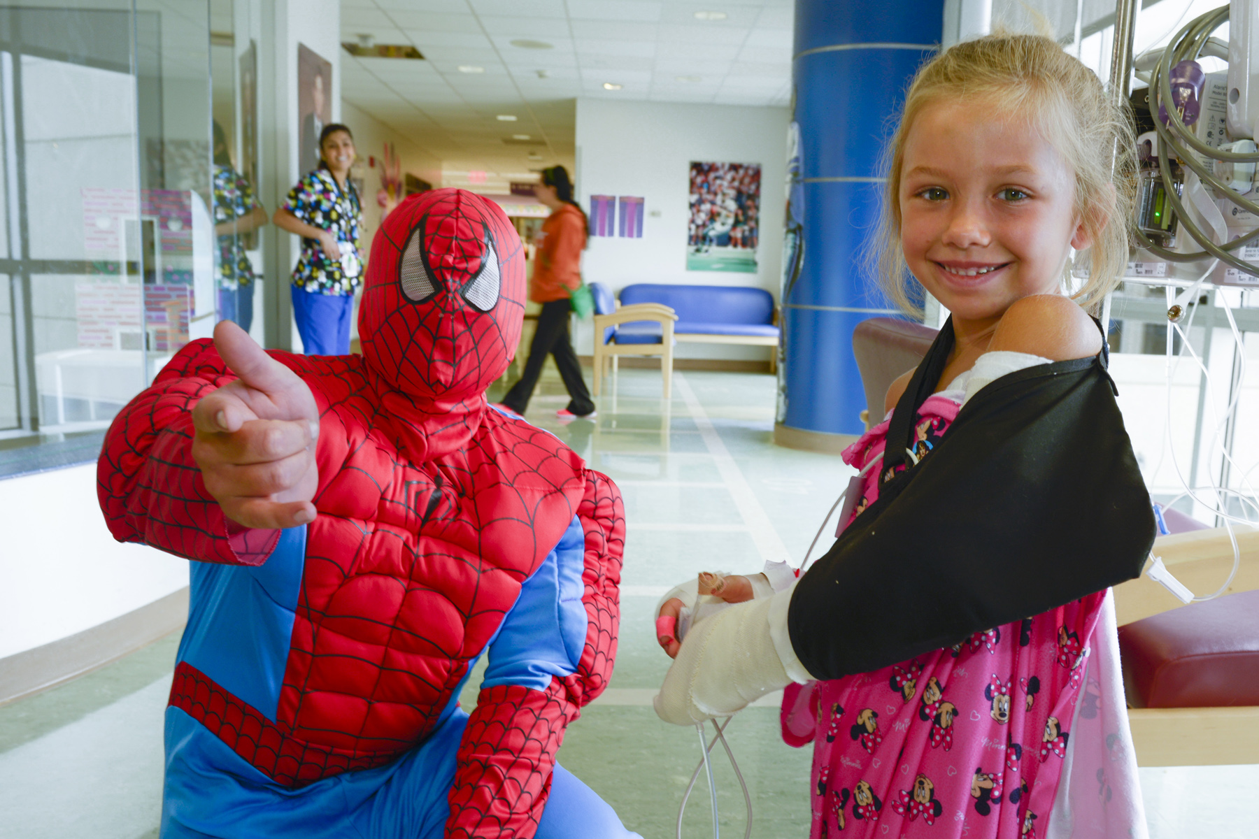 Children went to the hospital's playroom to visit with Spiderman.