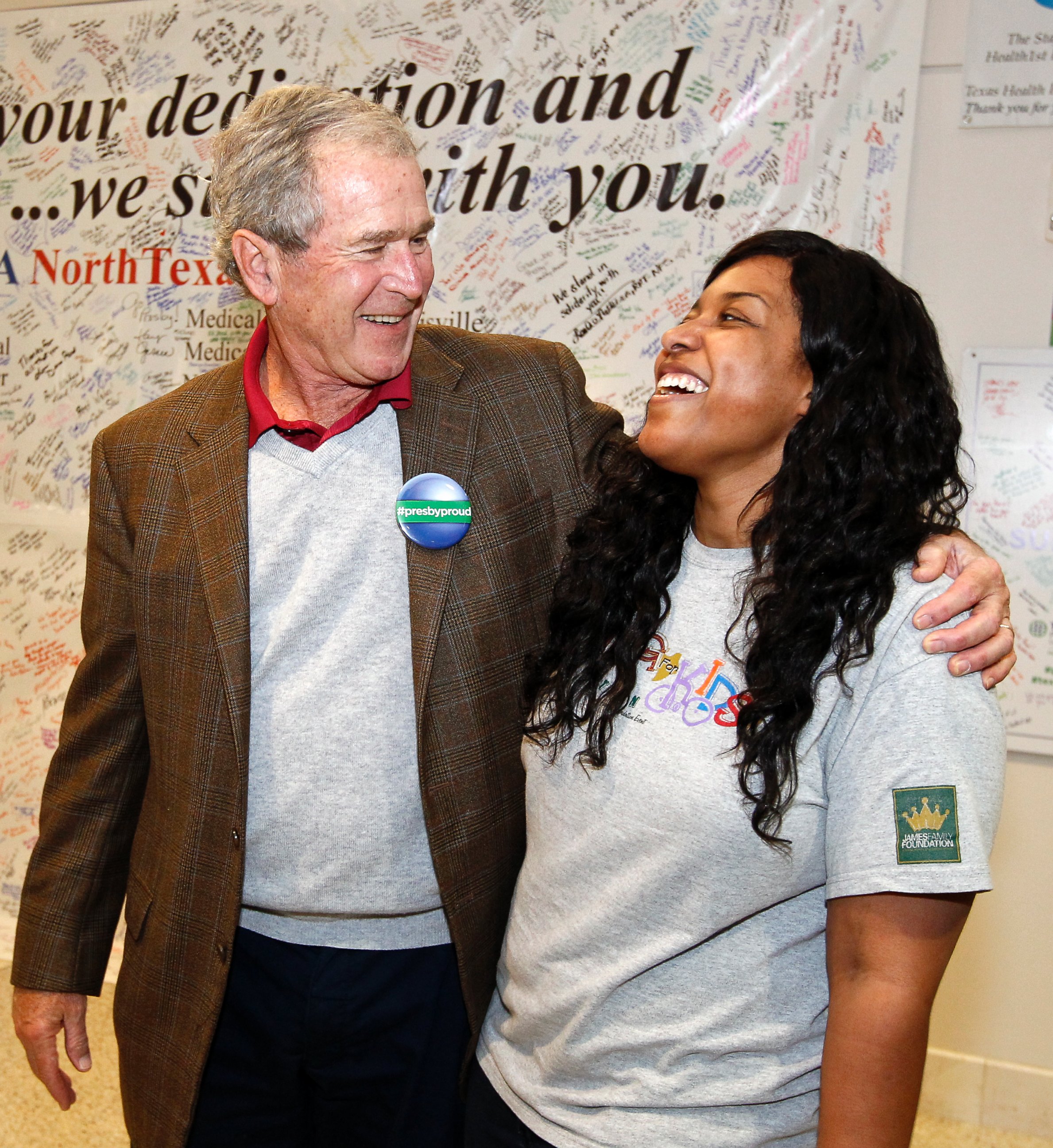 PHOTO: Former President George W. Bush walks into Texas Health Presbyterian Hospital Dallas on Nov. 7, 2014, where he visited with caregivers. 
