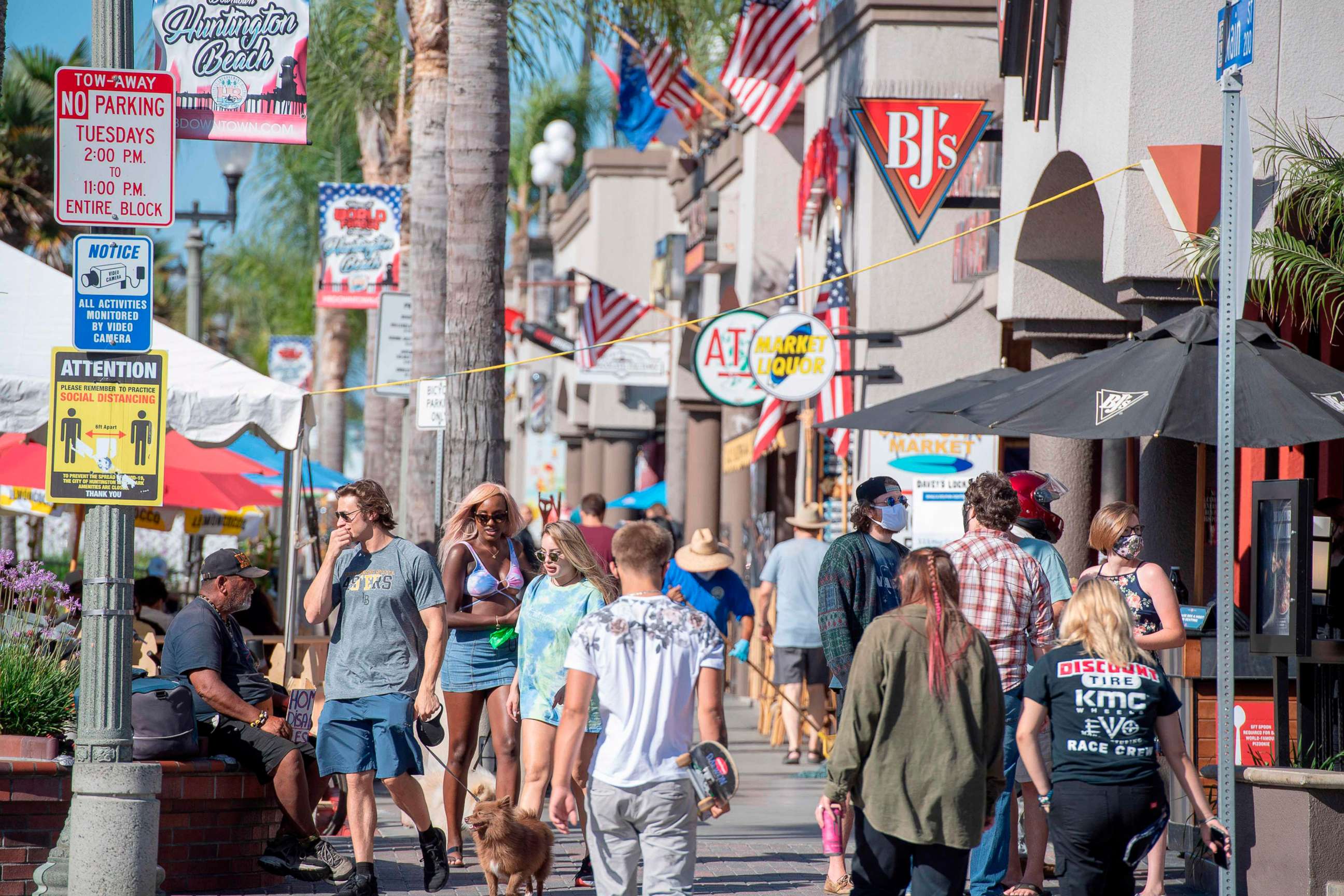 PHOTO: A sign advises people to maintain social distancing, July 16, 2020, in Huntington Beach, Calif., amid the coronavirus pandemic.