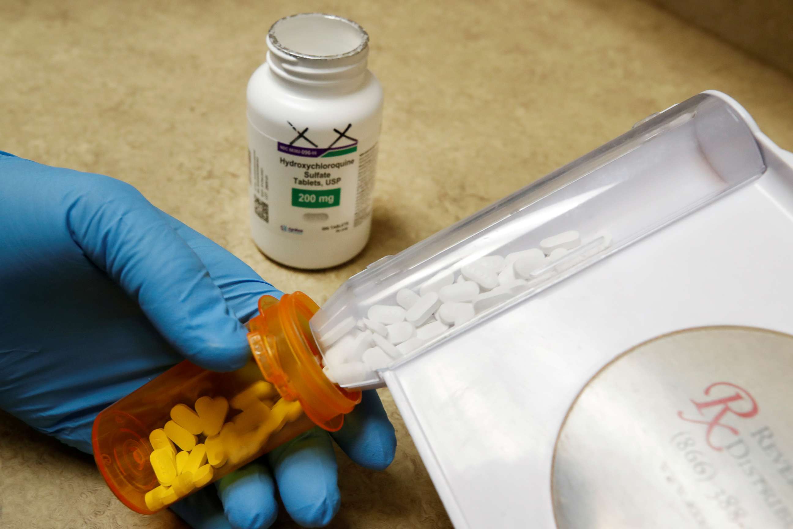 FILE PHOTO: In this May 27, 2020, file photo, the drug hydroxychloroquine is displayed by a pharmacist at a pharmacy in Provo, Utah.