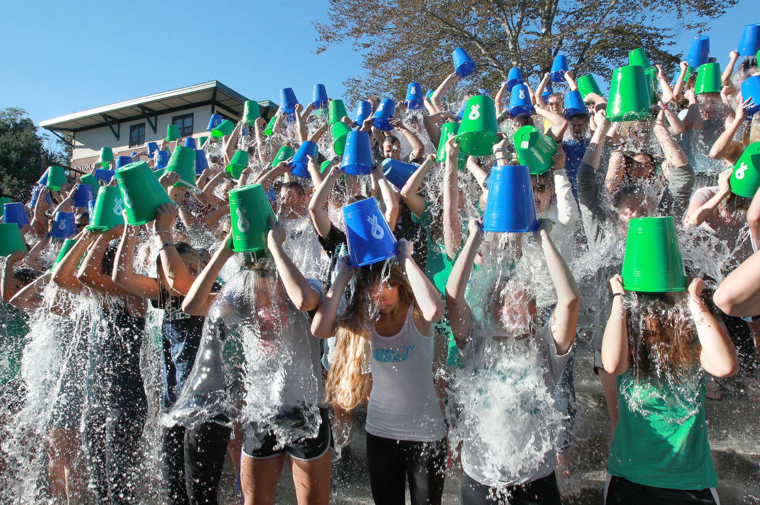 PHOTO: Students and others attempt to break the world record for number participants in an Ice Bucket Challenge during events celebrating the dedication of Peter Frates Hall at Endicott College in Beverly, Mass., Sept. 13, 2016.