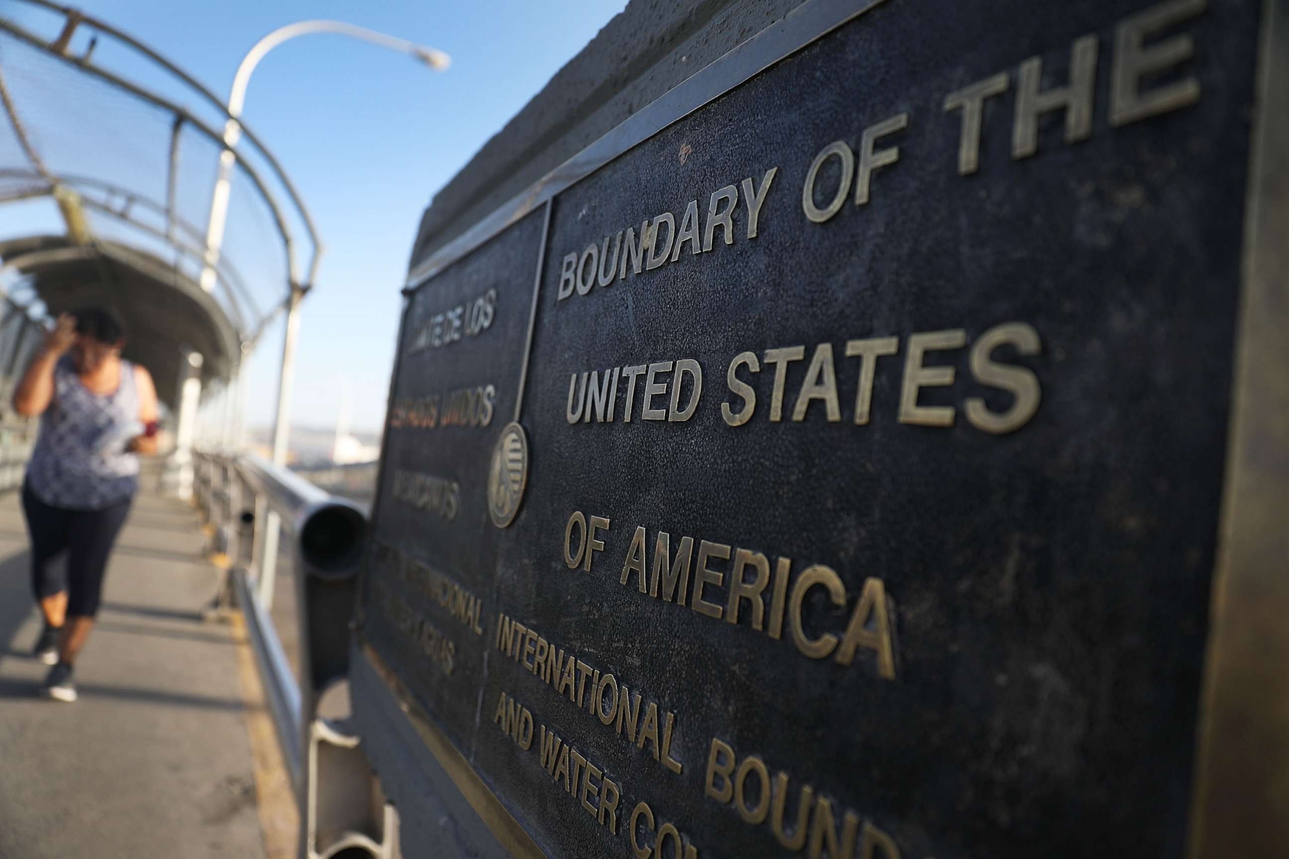 PHOTO: A plaque marks the U.S. border on the Paso Del Norte Port of Entry bridge which connects the U.S. and Mexico on July 23, 2018 in El Paso, Texas. 