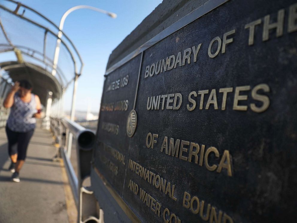 PHOTO: A plaque marks the U.S. border on the Paso Del Norte Port of Entry bridge which connects the U.S. and Mexico on July 23, 2018 in El Paso, Texas. 