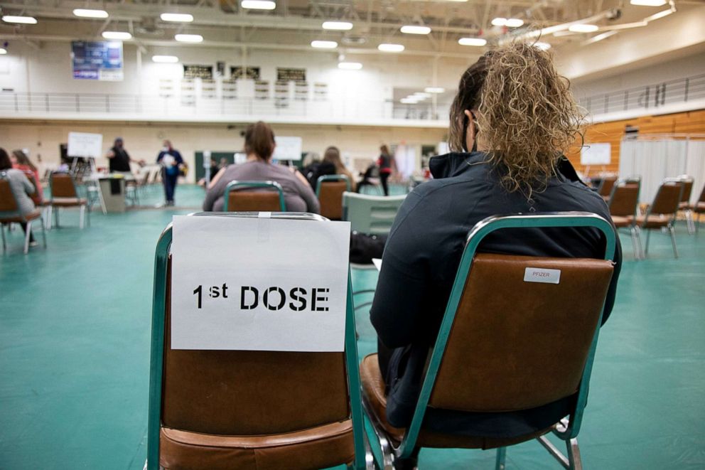 PHOTO: Immune compromised individuals and other eligible groups stood in lines to receive a Covid-19 vaccines at area clinics set up in schools across Chillicothe, Ohio, Feb. 27, 2021.