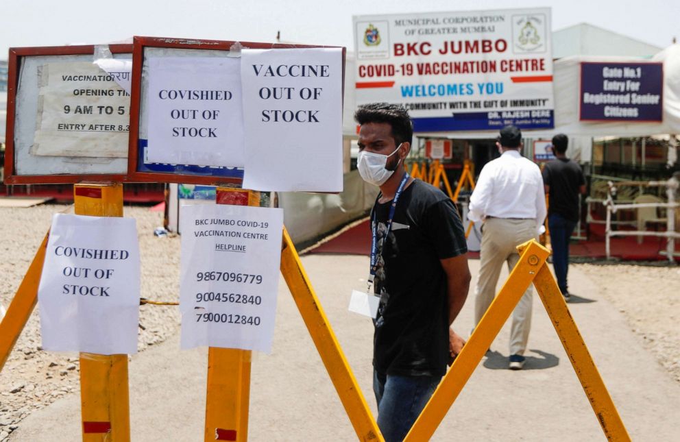 PHOTO: Notices about the shortage of COVISHIELD, a COVID-19 vaccine manufactured by Serum Institute of India, are seen outside a COVID-19 vaccination center in Mumbai, India, April 20, 2021.