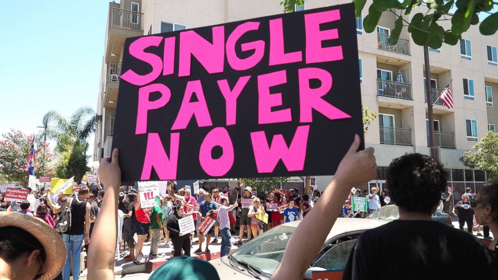 PHOTO: People rally in favor of single-payer healthcare for all Californians outside the office of California Assembly Speaker Anthony Rendon, June 27, 2017, in South Gate, Calif.